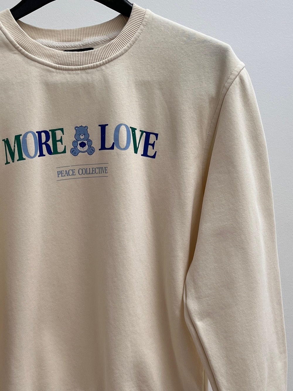 Peace Collective Care Bears more love crewneck sweatshirt S ivory grumpy bear